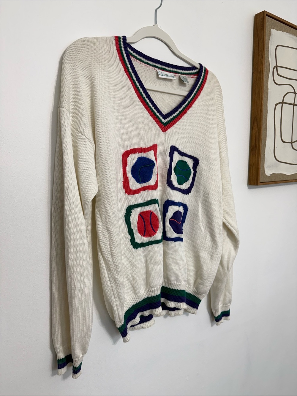 White V-Neck Sweater with Multi-Color Graphic Trim